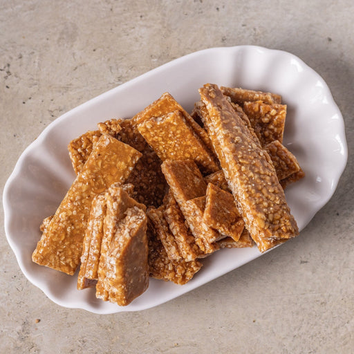 White plate with peanut brittle