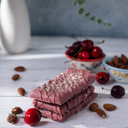 Stack of toffee bars made with Ruby Chocolate, Door County Cherries and Almonds