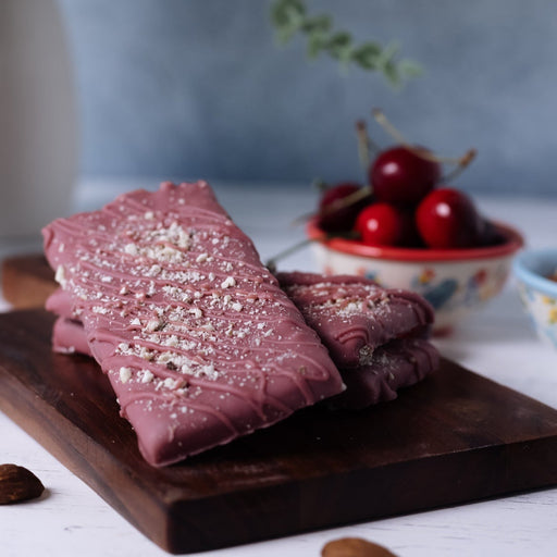 Stack of ruby cherry almond toffee bars