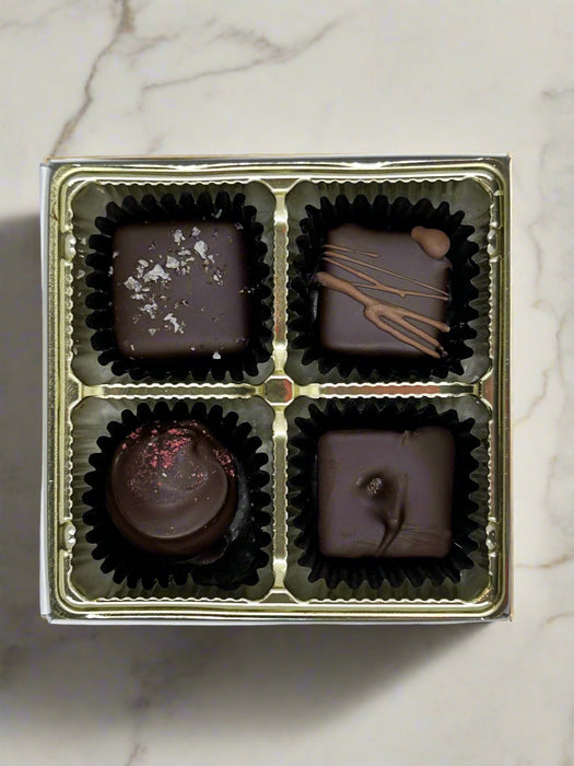 Truffle box contains Sea Salt Caramel, French Silk, Dark Raspberry and Mint Meltaway in Dark Chocolate