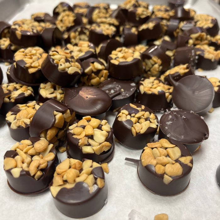 Tray of dark chocolate cashew clusters