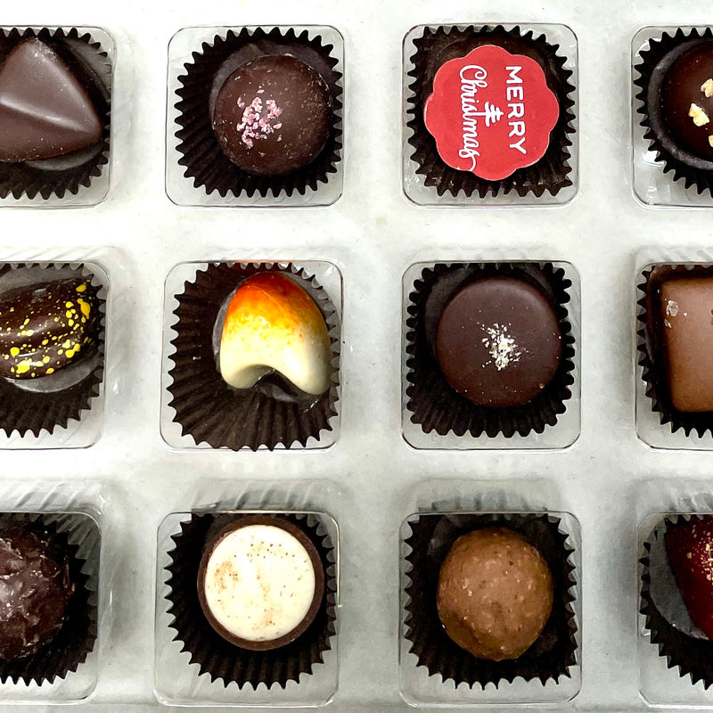 12 truffles in a Christmas Gift box. 
